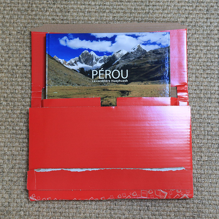 Colis dans lequel est livr le livre-photo Cewe