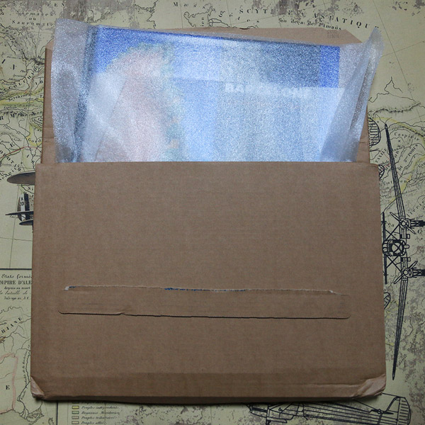 Le colis dans lequel est livr le livre-photo Photoweb