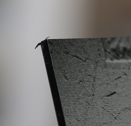 Petit dfaut de dcoupe sur le coin suprieur gauche